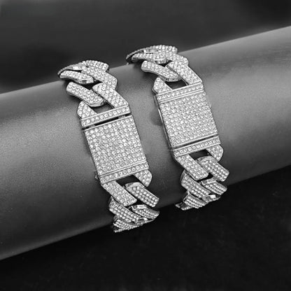 Iced‑out three‑row Cuban link necklace for men.