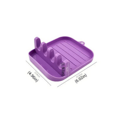 Green Cutlery Rack for Organized Kitchen Storage.