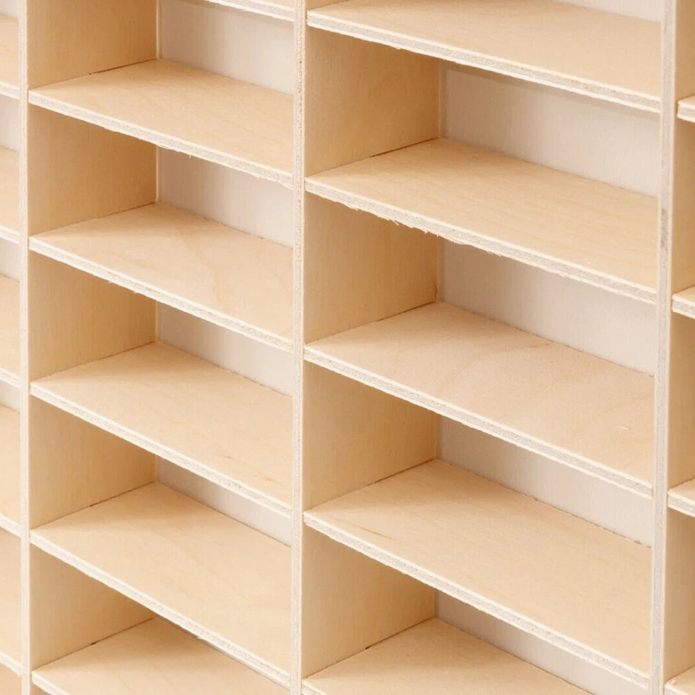 Wood display shelf with 80‑grid diecast storage.