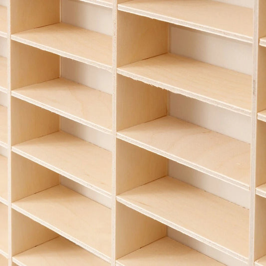 Wood display shelf with 80‑grid diecast storage.